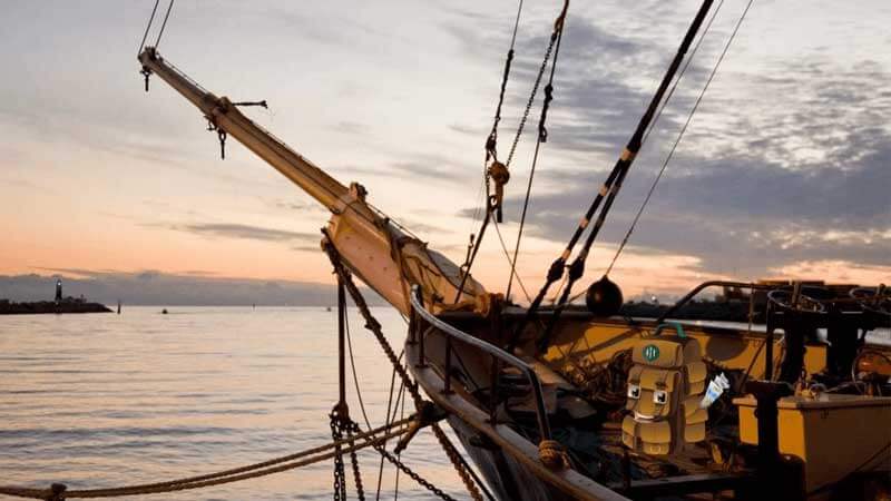 A sailing ship on the sunset