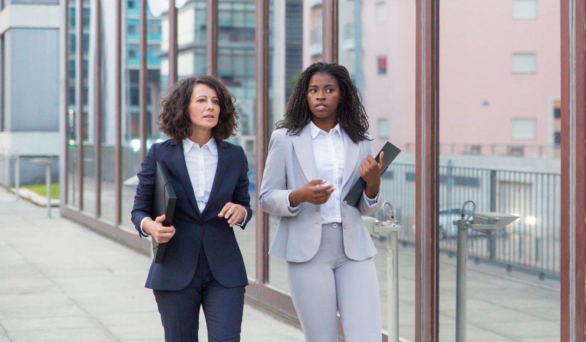 Two businesswomen discussing