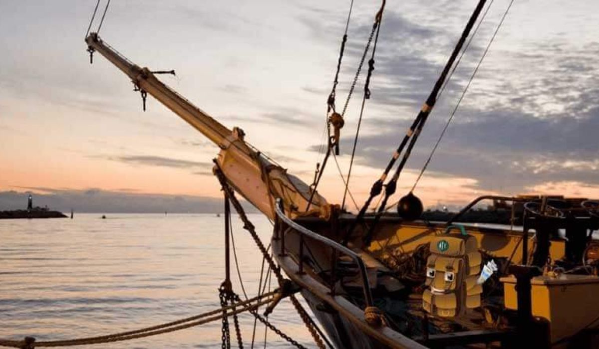 A sailing ship on the sunset