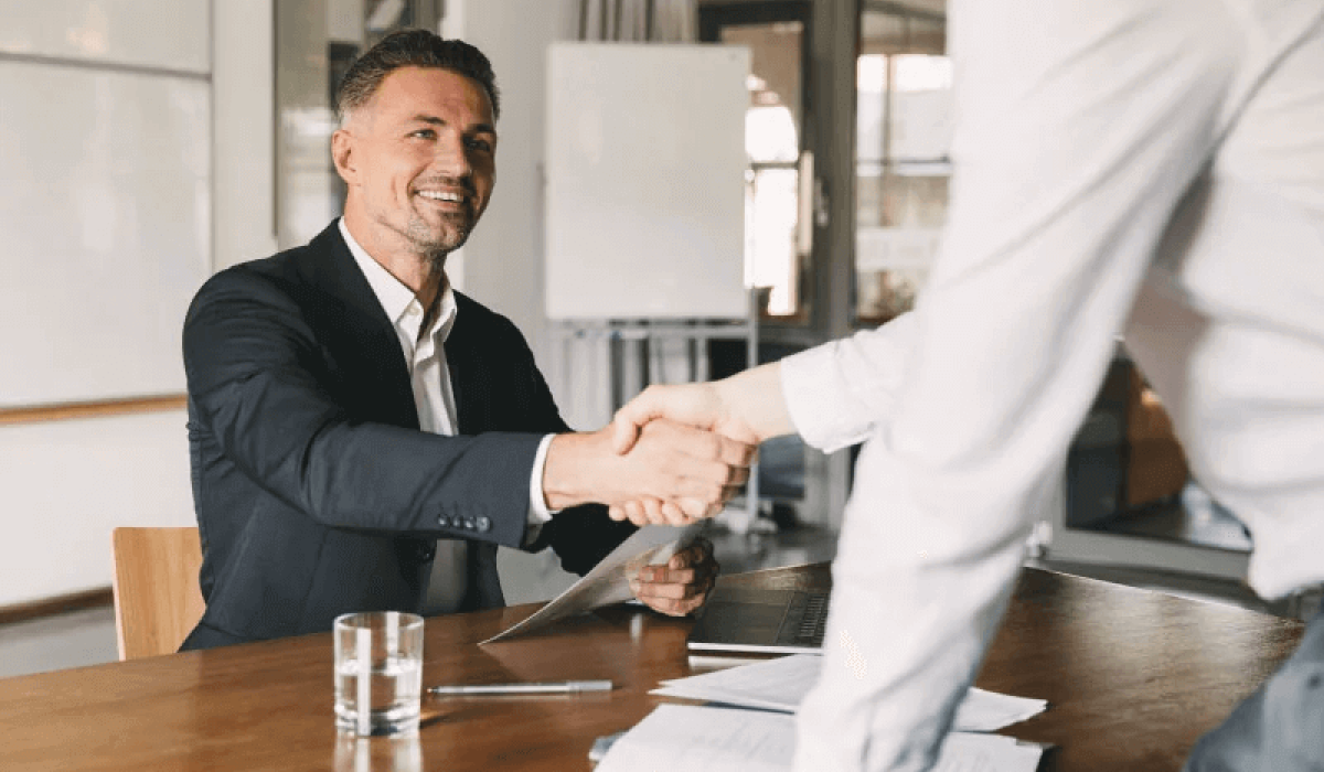 Two businessmen shaking hands