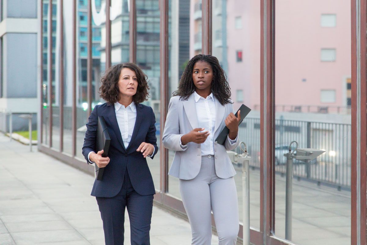 Two businesswomen discussing